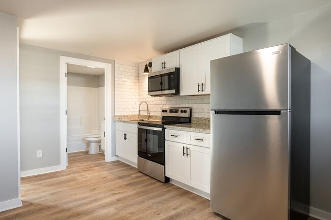 Building Photo - Discover Modern Living at Genesis Apartmen... Unit 17