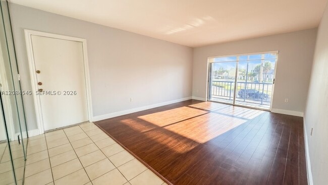Building Photo - 7847 Miller Dr Unit A205