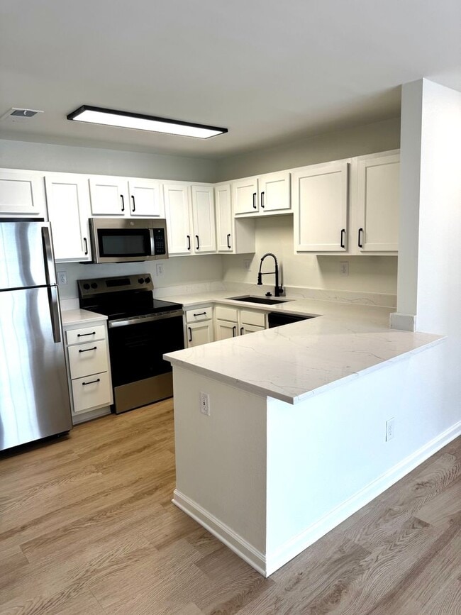 Photo - Fully Renovated 3BR/3BA Condo at Harper Fl...