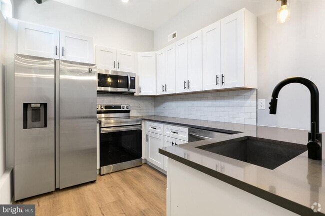 Building Photo - 3965 Lancaster Ave Unit 104 Rental