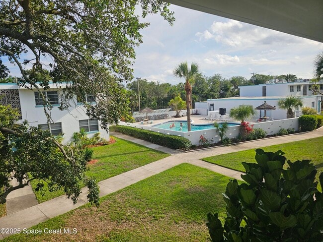 Building Photo - 8401 N Atlantic Ave Unit E4