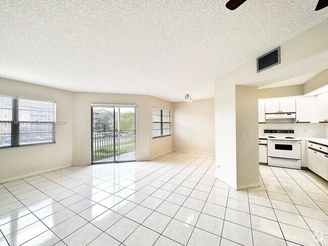 Building Photo - 12500 SW 5th Ct Unit 213M Rental