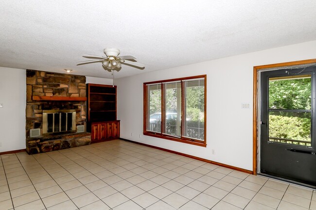 Photo - Two Bedroom, 2 Bath, 1-Car Garage, 1179 sq ft feet home with wood burning fireplace. and screened...