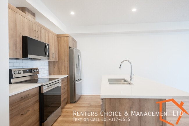 Photo - NEW 2 BEDROOM LOWER LEVEL SUITE WITH ASSIGNED PARKING