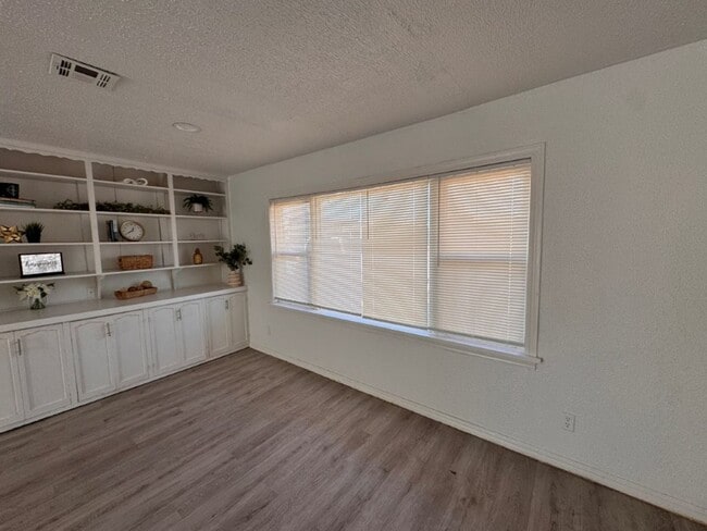 Photo - 2 bed 2 bad!  New paint, new flooring, new range, fenced yard!