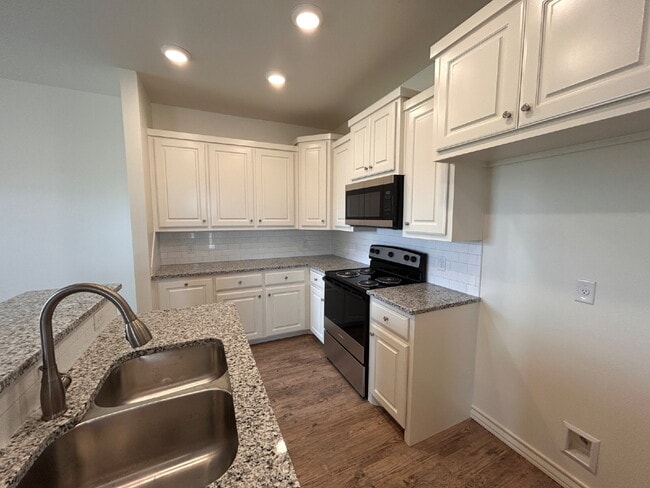 Photo - "Charming 3-Bed, 2-Bath Home with Granite ... Unit #A