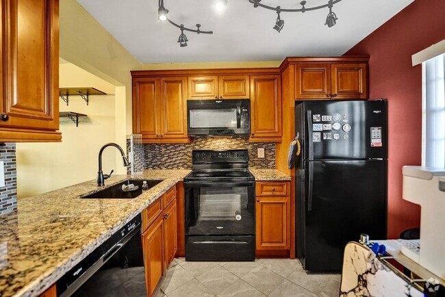 Building Photo - 9230 Lagoon Pl Unit 406 Rental