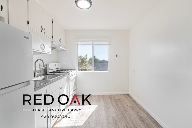 Photo - 7119 E Gage Ave Unidad 10