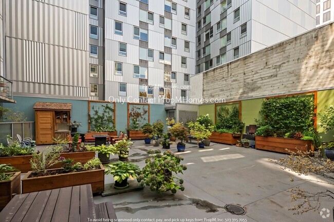 Building Photo - Charming Condo with Rooftop Garden and Com... Unit 209