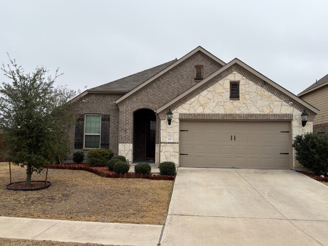 Building Photo - Four bed two bath on a corner lot with a pool in Sunfield. Gas cook top, double ovens. Open kitch...