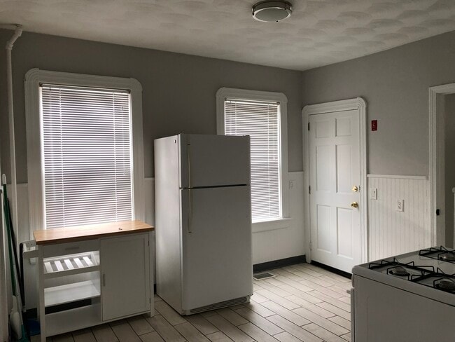 Kitchen, Rear Entrance - 22 Woonasquatucket Ave Unit 2nd Floor