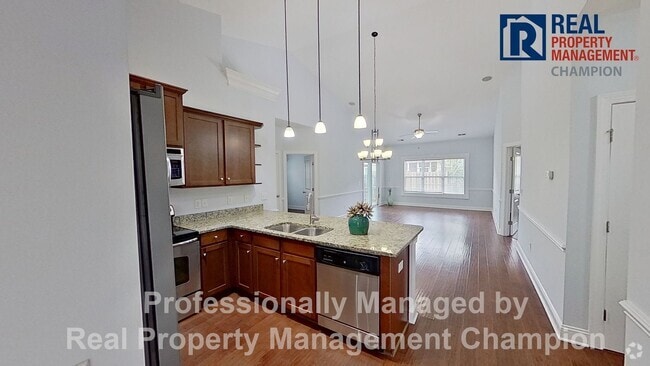 Building Photo - End Unit Townhome on One Level