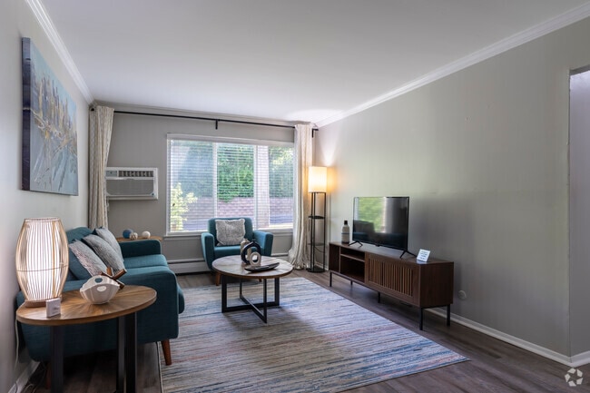 El apartamento Hemingway de 2 habitaciones y 1 baño - 725 pies cuadrados - Sala de estar - Shoreview Apartments