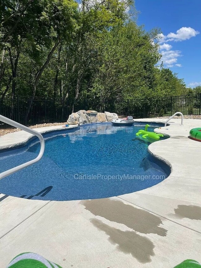 Photo - Modern Carlisle Rental with heated inground pool, fireplace, open floor plan, and finished basement