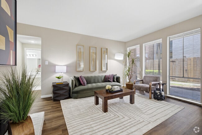 A2 1BR, 1BA - 797SF - Living Room - Woodlake on the Bayou Apartments