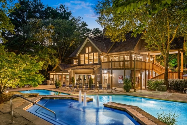 Pool View of Leasing Center Twilight - Calibre Woods Apartments