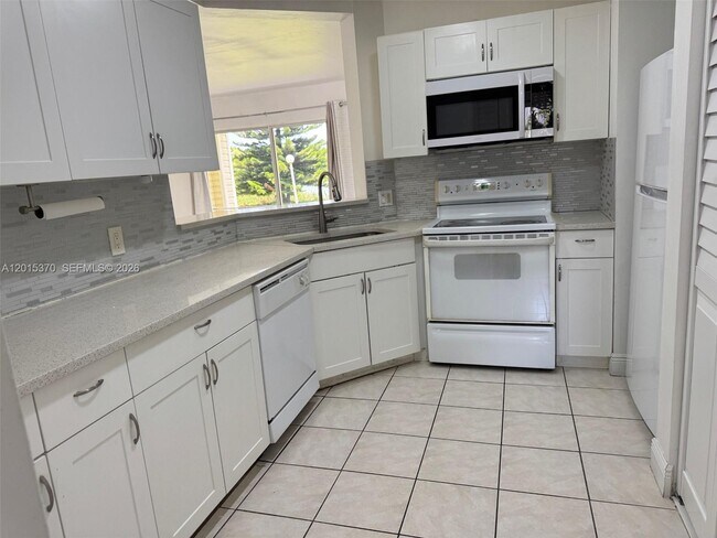 Photo - 3441 NW 44th St Unit 104