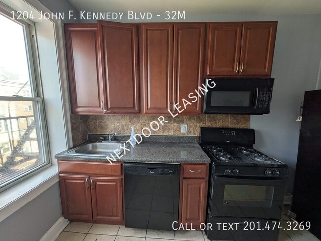Building Photo - 1204 John F. Kennedy Blvd Unit 32M