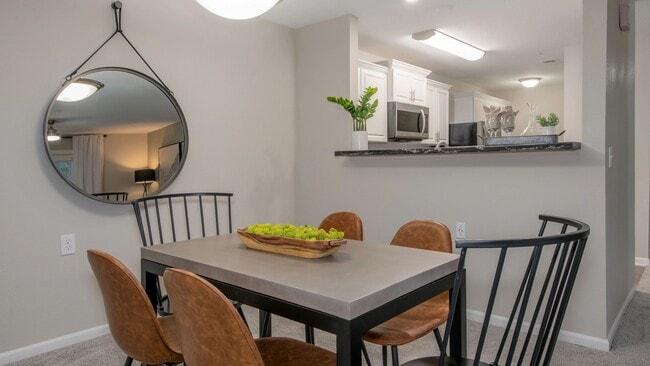 Cherish a separate dining area perfect for entertaining, featuring an open layout connecting kitchen and living spaces.