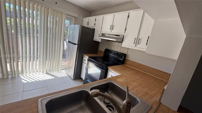 Photo - 3200 NW 5th Terrace Unidad 13