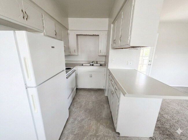 Photo - Upgrade Your Lifestyle, Not Your Budget – No Security Deposit Required! Unit Apt E