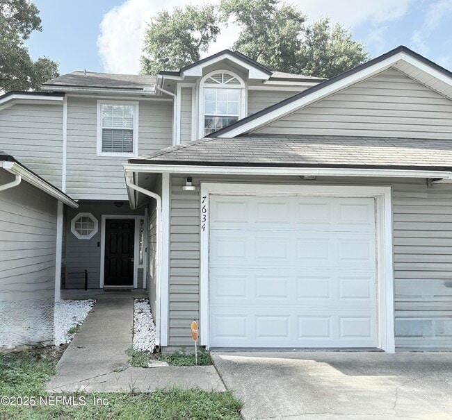 Photo - 7634 Rain Forest Dr W Townhome