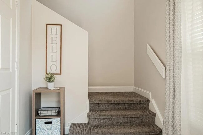 Stairs to Upper Level - 5090 Cedar Springs Dr Unit Naples Happy Place