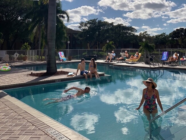 Refresh your lifestyle at Ponte Verde Apartments At Palm Beach Lakes. Our stunning pool area invites relaxation and fun, with plenty of sun loungers and vibrant surroundings. Dive into your new home today—schedule a tour now!