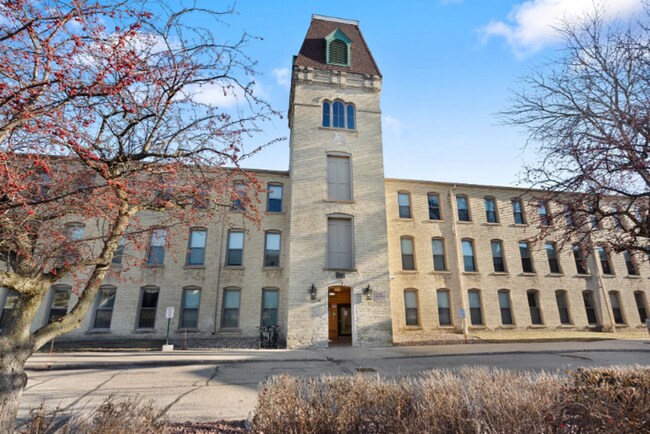 Building Photo - 2 Bedroom/Historic Riverfront Living with ... Unit Franklin Mill Apt 112