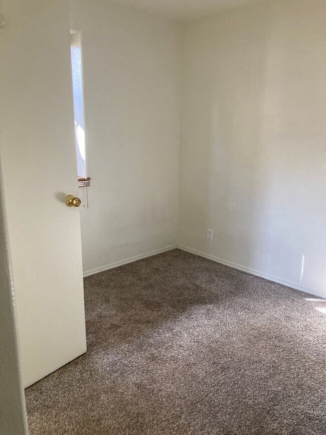 Photo - This spacious 2-bedroom, 1.5-bathroom town... Rental