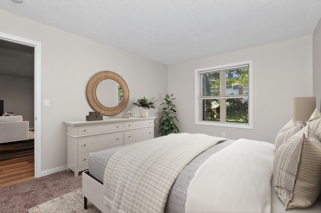 Transform your living space at Eagle Rock Apartments at Mohegan Lake. This beautifully designed bedroom features natural light, modern decor, and a welcoming atmosphere. Elevate your lifestyle and schedule a tour today!