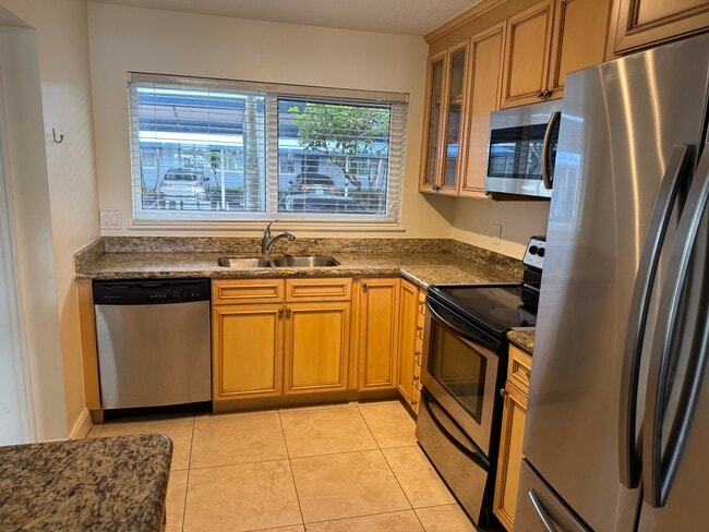 Building Photo - 651 E Woolbright Rd Unit Bermuda Cay E103’