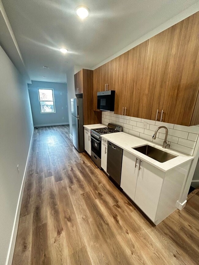 Building Photo - 4217 Mantua Ave Unit 2