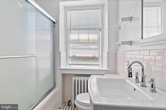 Photo - Welcome to this sunny and updated 4-bedroom, 2-bath row home in the heart of Mt. Airy! W/D! Large...