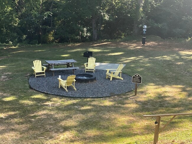 Join friends at the firepit - The Magnolia