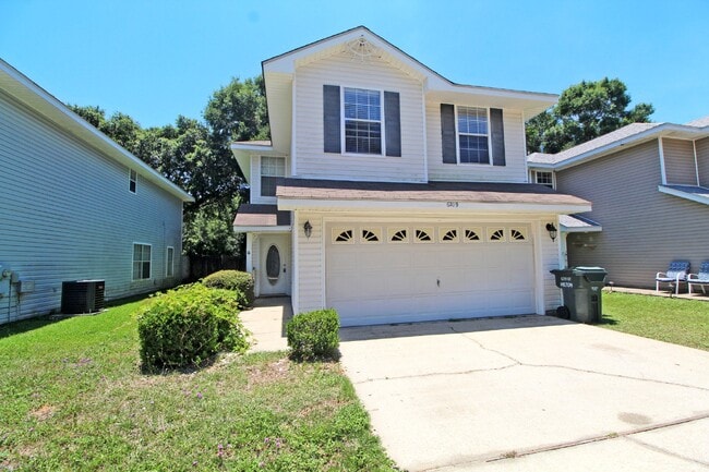 Photo - Modern 3-Bedroom Two-Story Home Featuring 2-Car Garage, Open Great Room with Fireplace, Private P...