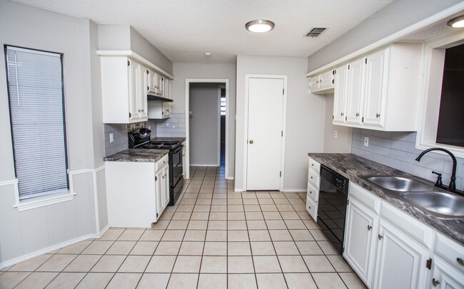 Photo - Available July 1st: Spacious 3 Bed, 2 Bath Ready for You!