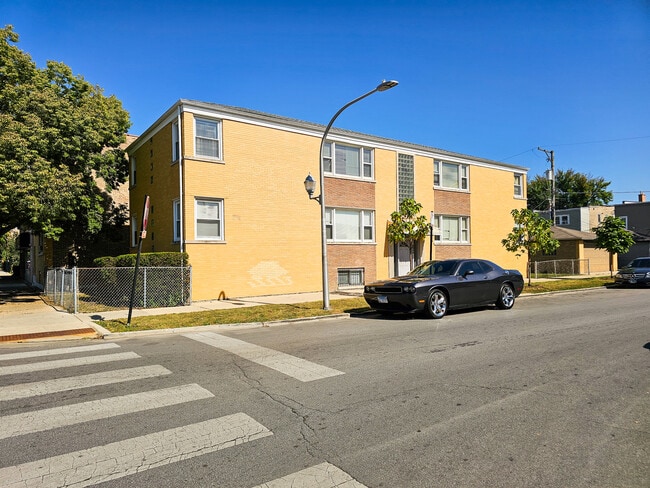 Building Photo - 5950 W Schubert Ave Unit 2W