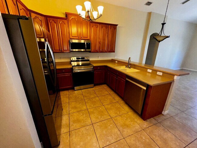 Photo - Timber Isle 4 bedroom home 2 bath home on a corner lot with New Kitchen Appliances!