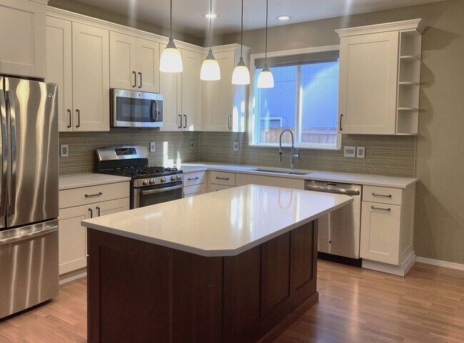 Photo - Beautiful Sherwood Home backs to Greenspace, Walking Distance to The Ridges! Entertainer's Backya...