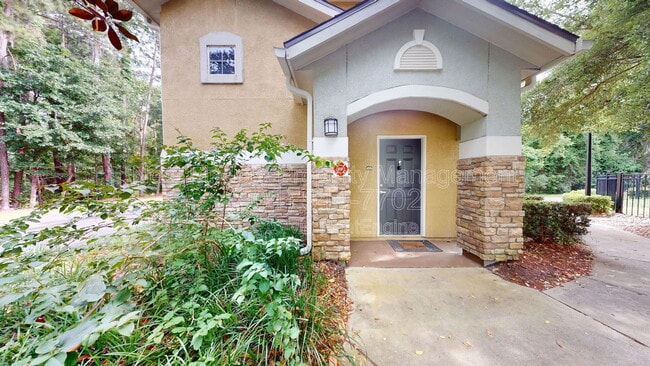 Building Photo - 8539 Gate Pkwy W Unit 1322