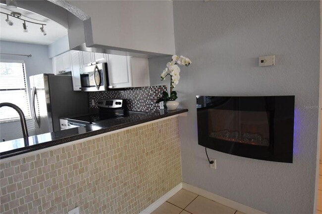 Photo - 10177 Sailwinds Blvd S Unit 203