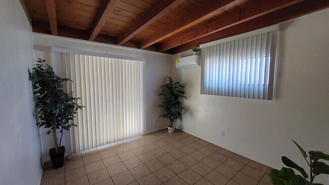 Photo - Available March 1, 2026. Updated 2 Bedroom 1.5 Bath Duplex with private dedicated pool.