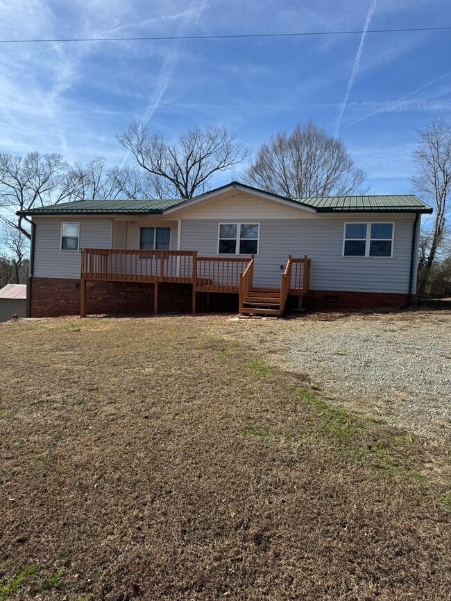 Building Photo - Spacious 4-Bedroom Rural Home on Private Acreage