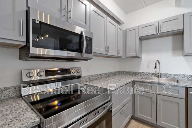 Building Photo - 130 N Pearl St Unit 1002