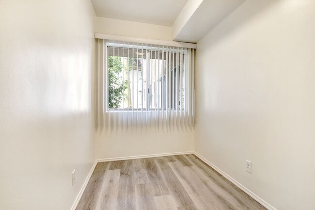 Dining area with wood inspired floors - Natick Park