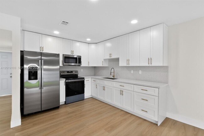 Photo - 7090 W 2nd Ct