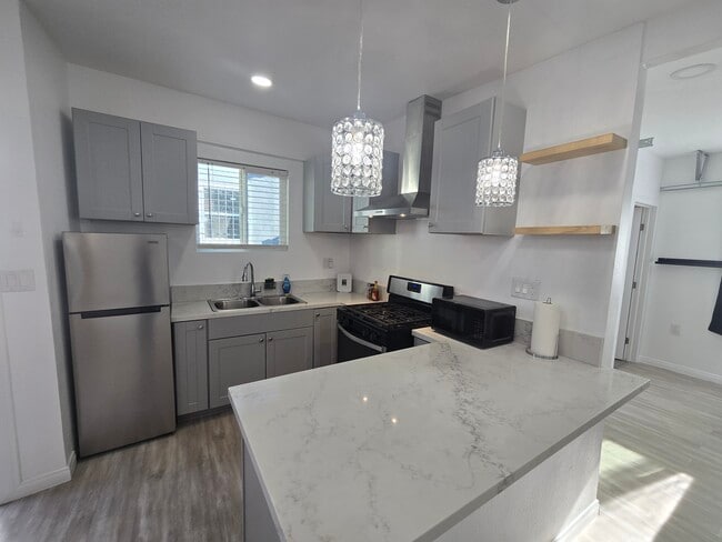 Photo - 1943 Claudina Ave Unidad Back house