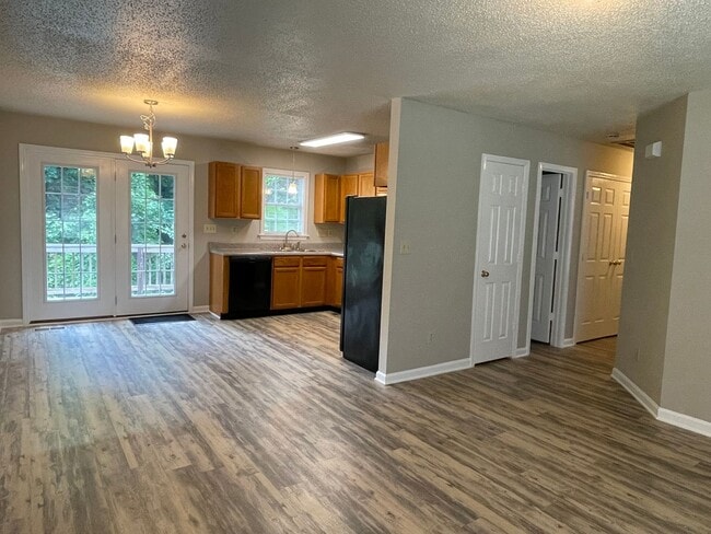 Photo - SW Updated Home - Wood Laminate Flooring, Front Porch & Deck!