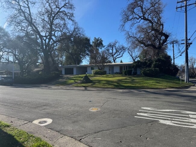 Building Photo - Beautifully Furnished and Recently Painted, Corner Lot Home Features a Fenced Backyard with an In...